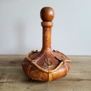 Leather covered glass decanter. Made in Italy. As is.